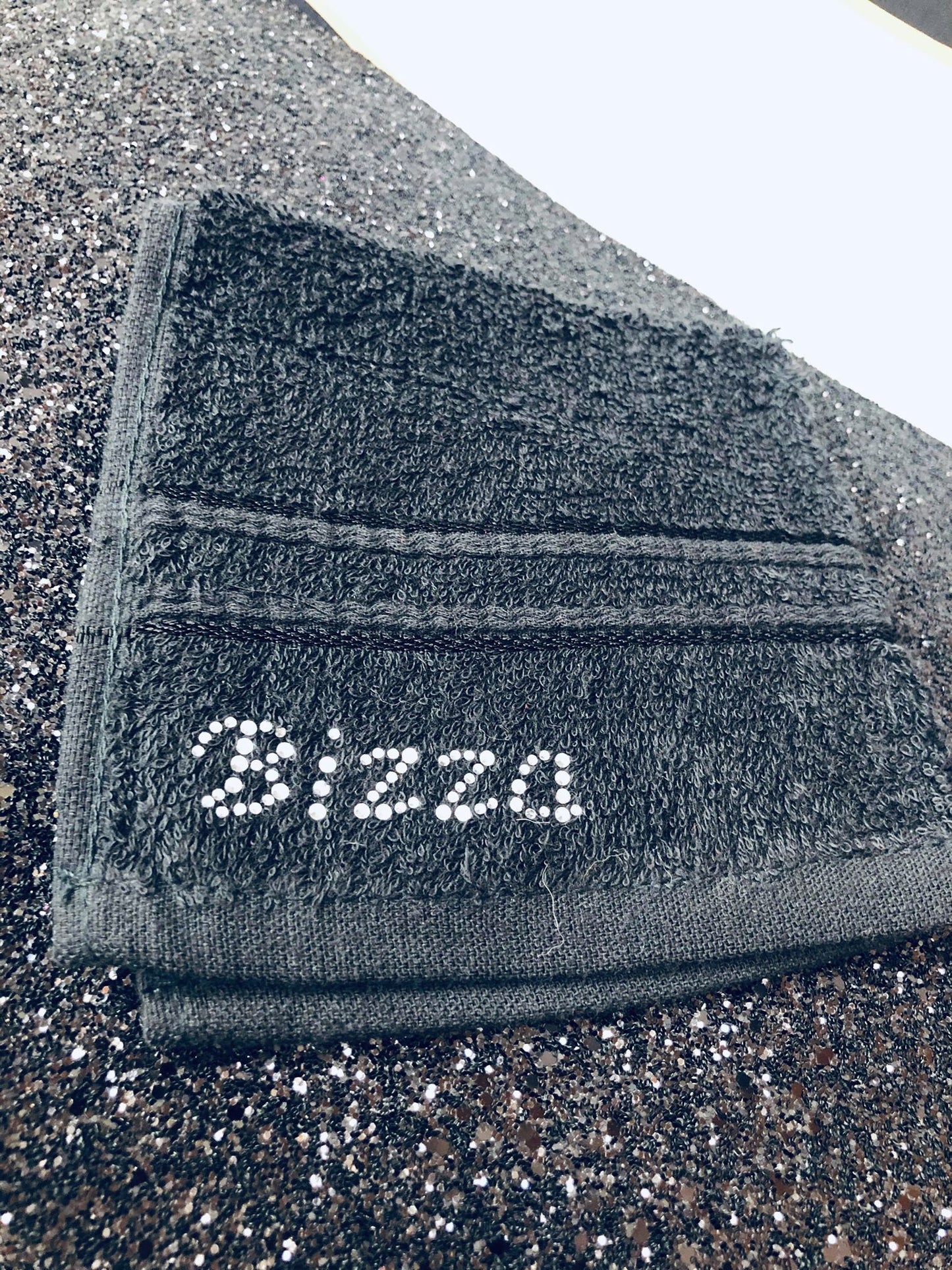 DIAMANTE BRANDED FACE CLOTH